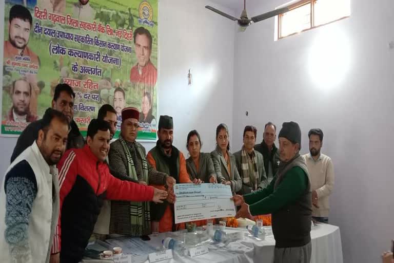 check given to farmers dhanaulti