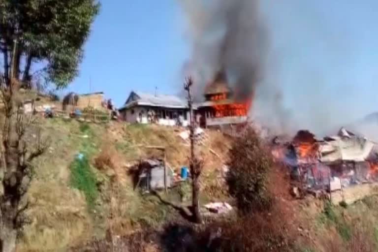 Fire broke out in some houses along a hillside