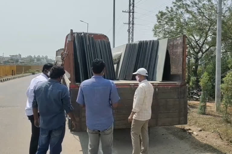 Police seize vehicles moving granite slabs illegally in Prakasam district Martur