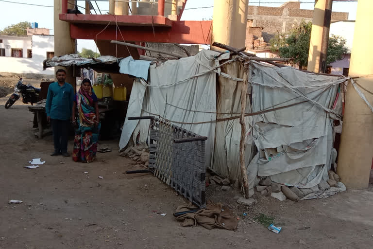 Couple living in hut