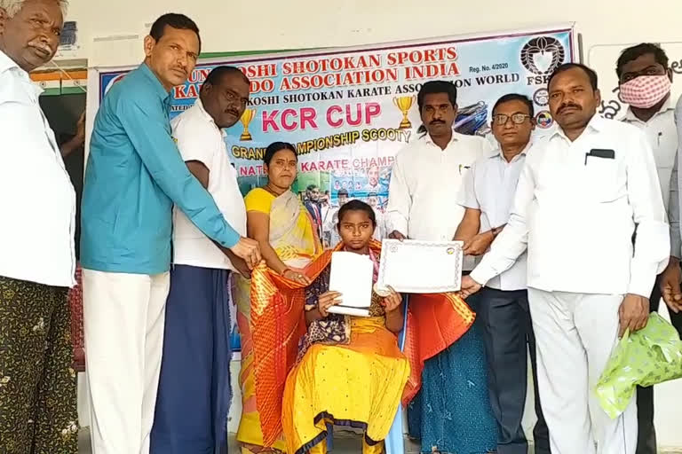 Deeksha Sri from Mulugu district won the gold medal in the state level karate competition organized in Hyderabad on the occasion o