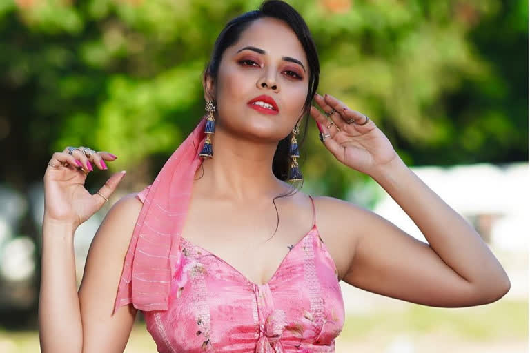 anchor anasuya counter to netizen about her photo