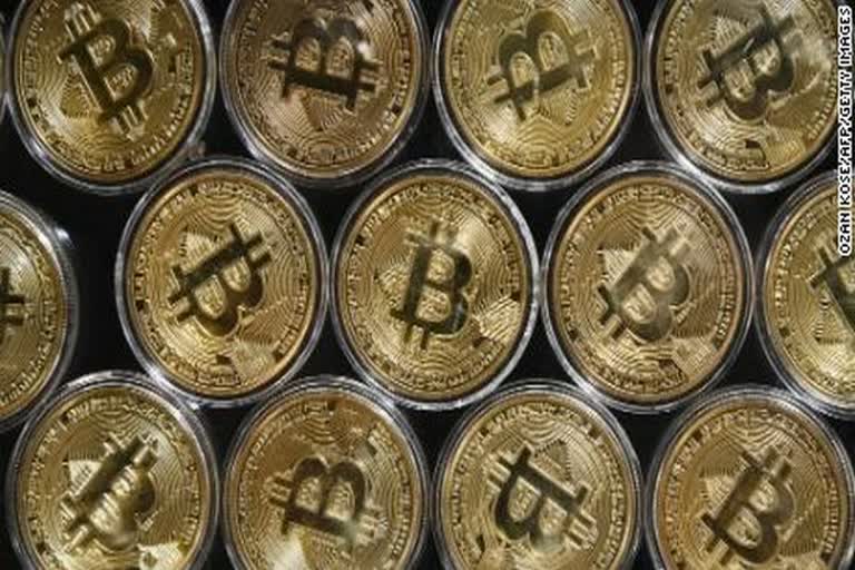 Bitcoin's market value tops $1 trillion