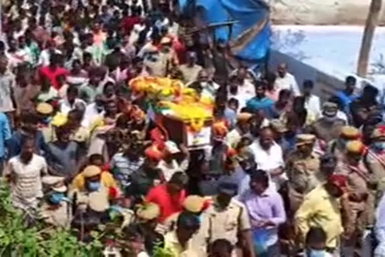 Soldiers conducting a formal funeral for a soldier from Guvalakuntla village, Kottapalli mandal, Kurnool district