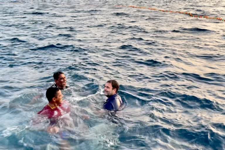 Rahul Gandhi swimming in the sea with fishermen