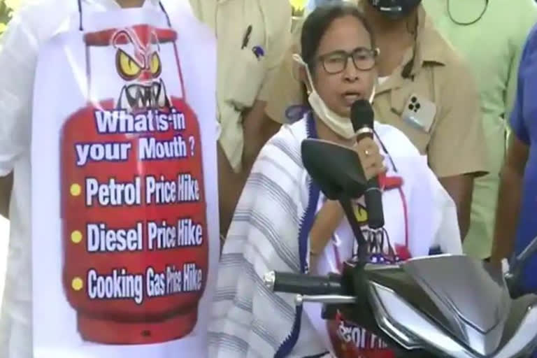 Mamata Banerjee rides electric scooter to protest against rising fuel prices