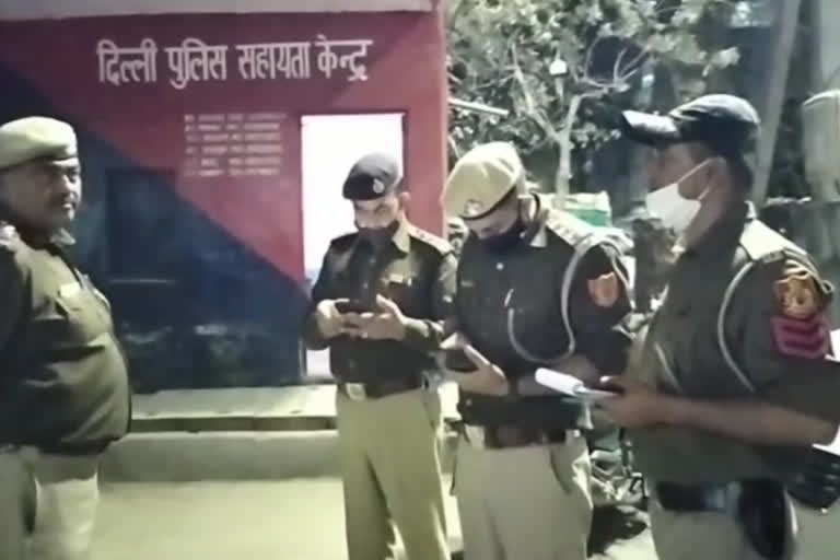 Policemen investigating the incident