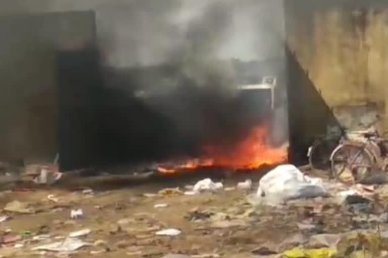 fire in a auto tipper during dumping garbage