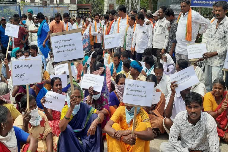 farmers protest in front of electorate in nirmal district