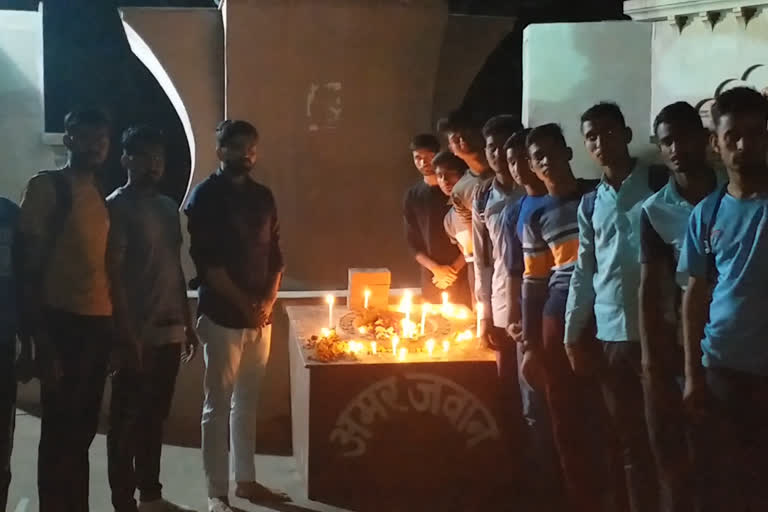 alwar news, Students take out candle march