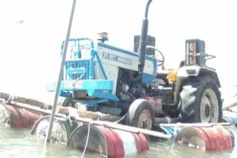 farmers-run-tractor-in-water-by-applying-12-drums, video-goes-viral