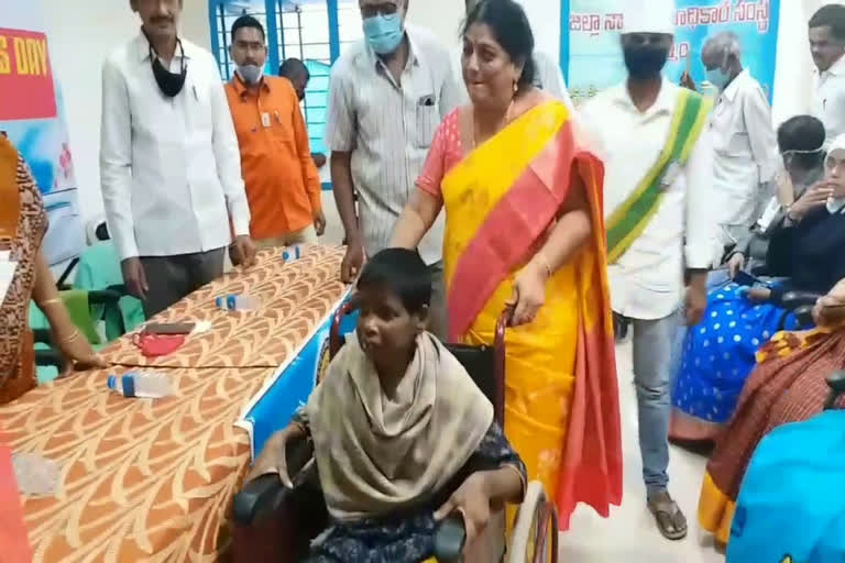 Distribution of tricycles to the disabled under the auspices  international women's day  by  Chaitanya Foundation