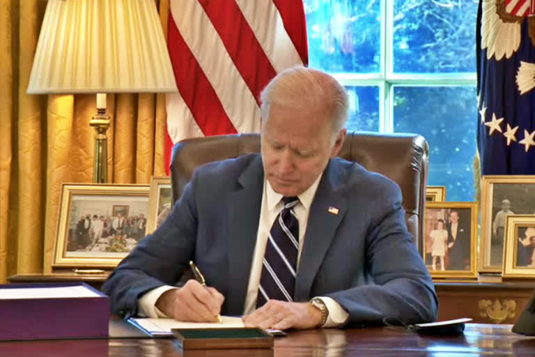 Biden signs $1.9 trillion Covid relief bill into law