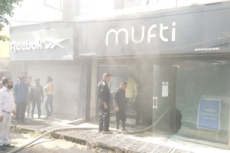 fire catches in cloth showroom