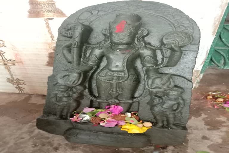 ancient statue of lord vishnu found in river