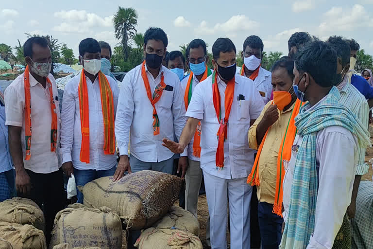 BJP state vice-president Manohar Reddy inspected a grain center in Nalgonda district