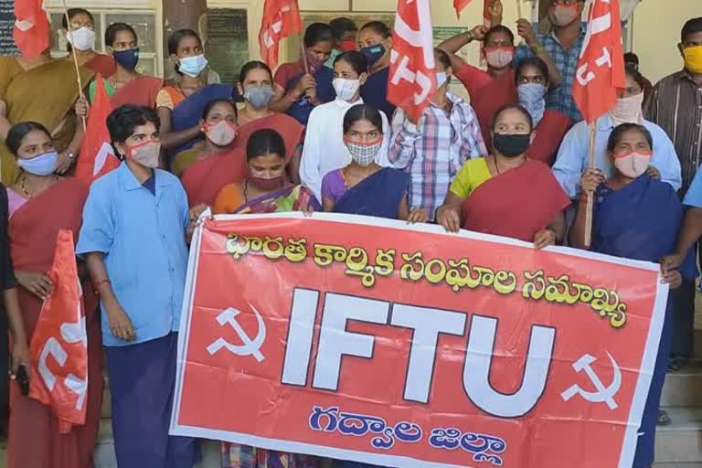 sanitation workers protest infront ofgojulamba gadwal government hospital