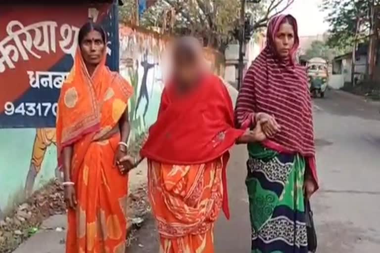 elderly woman beaten in dhanbad