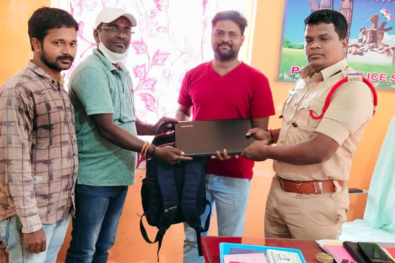 Police return a forgotten laptop in warangal rural district