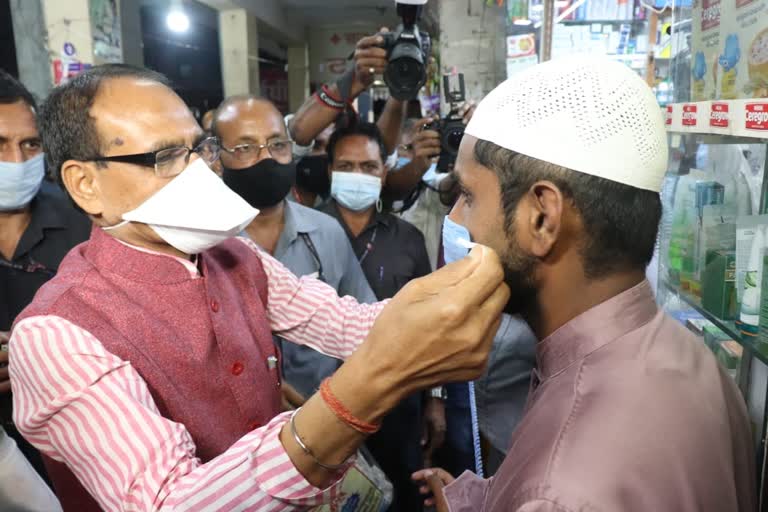 CM wearing mask