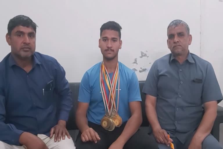 palwal power lifter dheeraj won medal