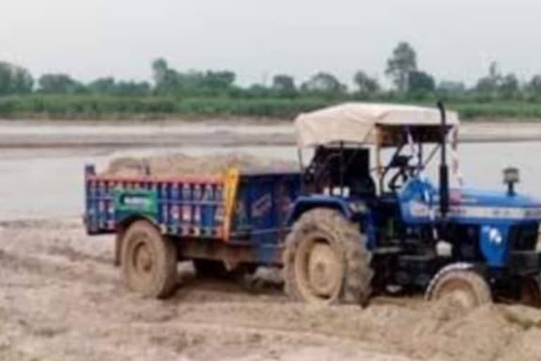 Two tractors caught doing illegal mining