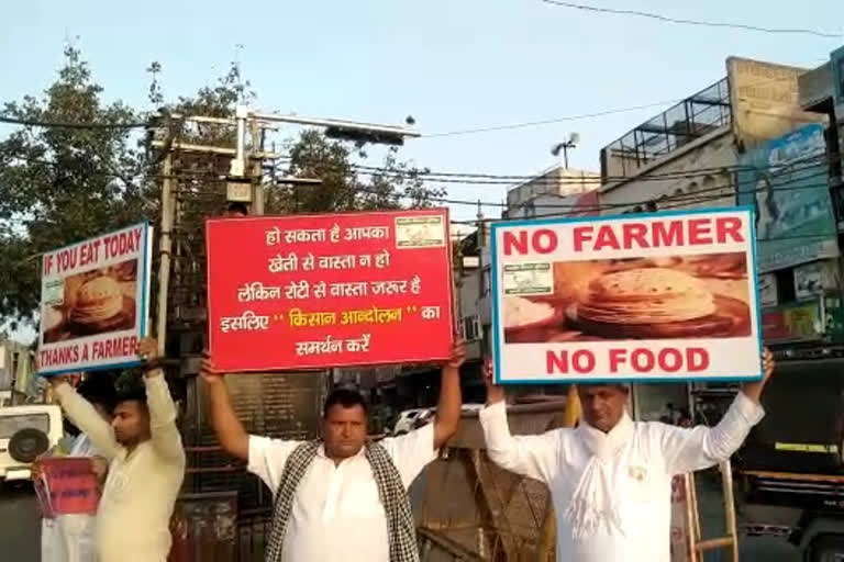 farmers protested with banners at the main intersections of Karnal