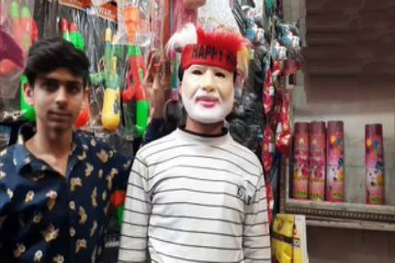 Ahead of Holi festival, shopkeepers in Aligarh say there is an increase in demand of PM Modi's plastic face mask & his beard