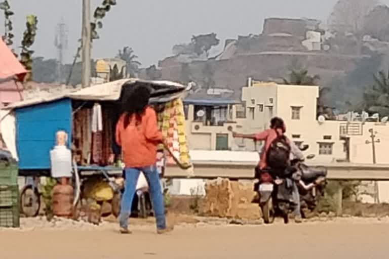 mentaly disabled woman roaming with weapon