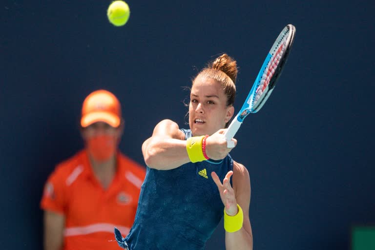 Sakkari ends Osaka's winning streak