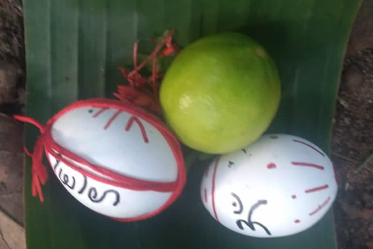 Eggs, lemon lying on banana leaf