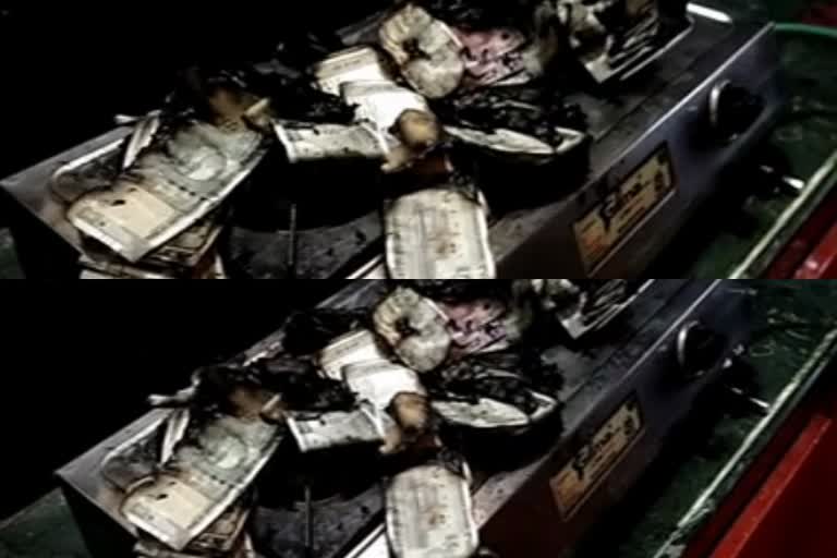 man burnt Rs.five lakhs