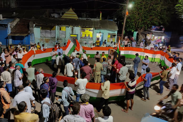 Candle rally in Saluru