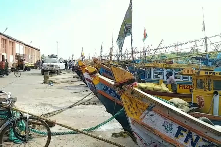 boats are reached to jetty