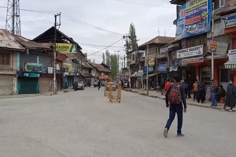 permission to open only fifty percent of shops in budgam