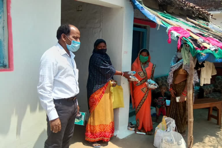 Anganwadi workers sharing ready to eat