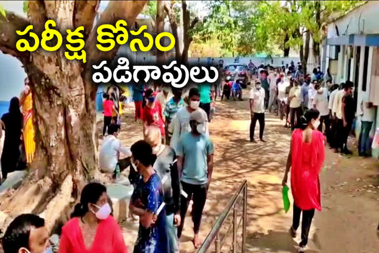 queue for covid test, queue for covid test in rangareddy, corona in rangareddy district