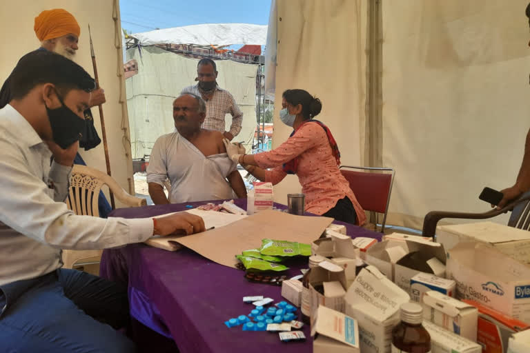 Farmers taken corona vaccine on tikri border jhajjar