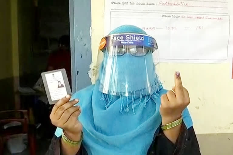 wearing masks and voting at warangal corporation, warangal corporation election news today