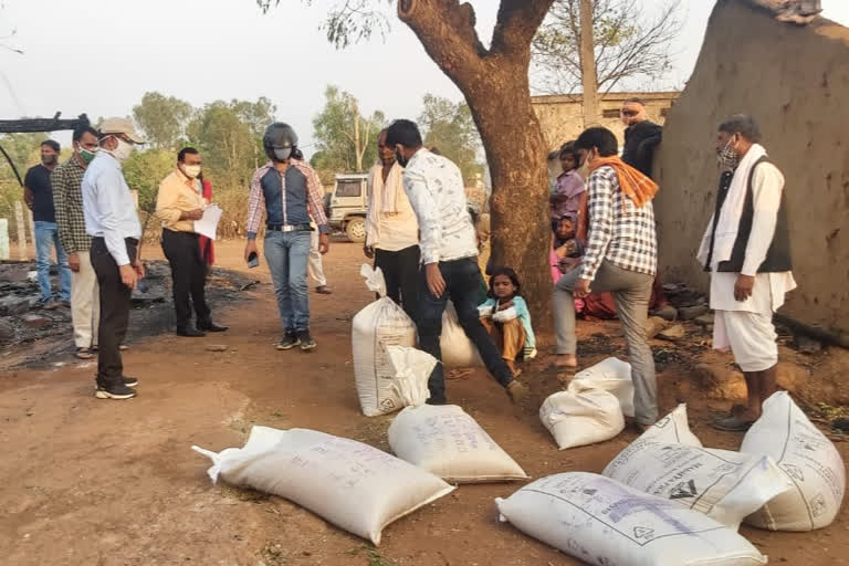 SDM distributing relief material in berasia