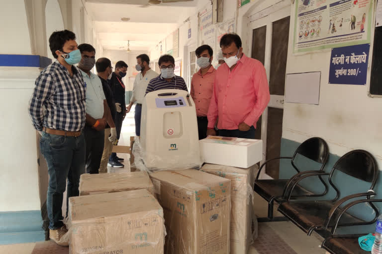 MLA Rajesh Shukla with oxygen concentrator