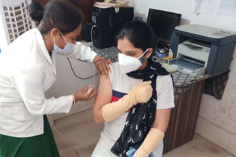 Youth excitedly getting corona vaccine