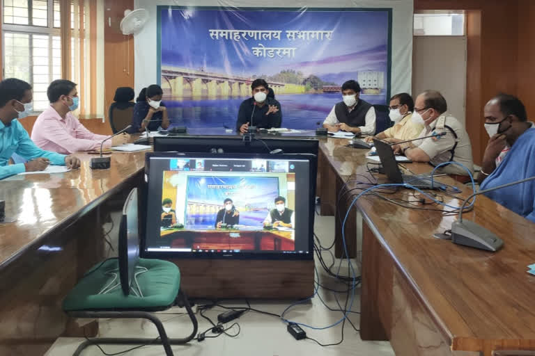 dc held meeting through video conferencing in koderma