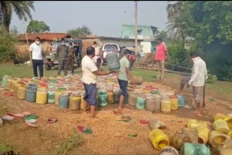 police raid illegal liquor factory in dhanbad