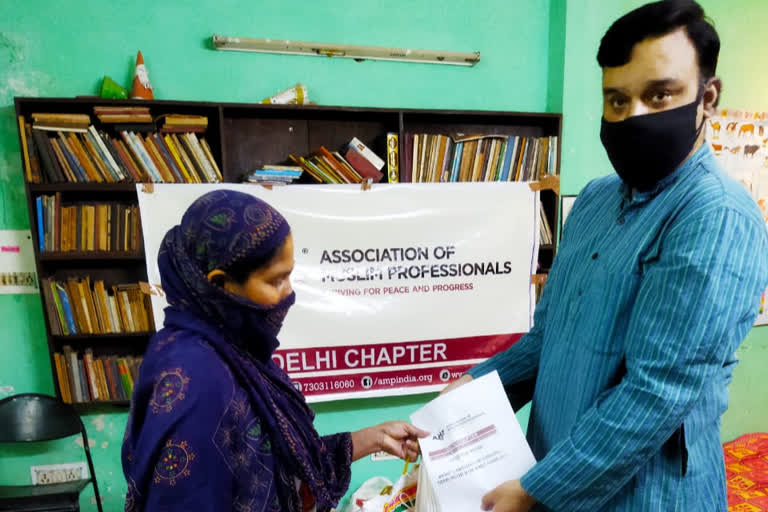 Distribution of Eid ration kits to the poor from AMP_vis_up_noida_upur10010