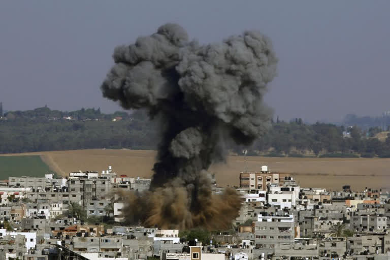 Smoke rises after an Israeli airstrike in Gaza City,