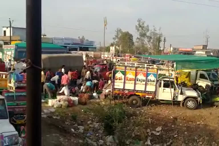 Crowd gathered in fruit market