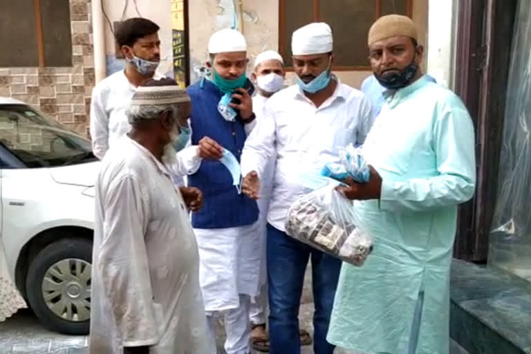raza action committee distributes ration for needy in bareilly