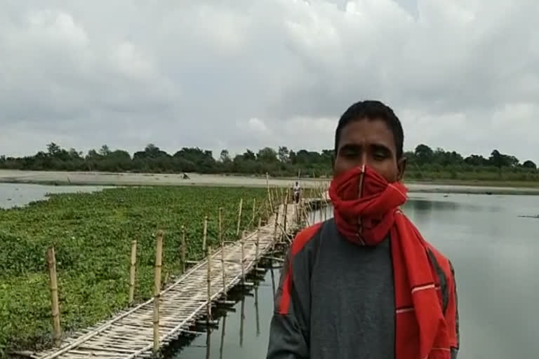 bamboo bridge communicating many villages are about to be under water