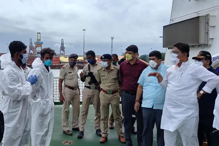 minister  r ashok on tug boat